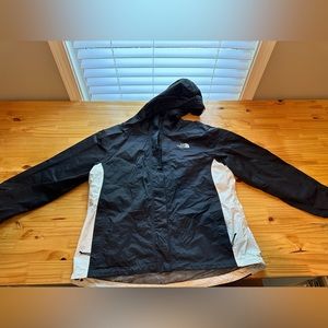 The North Face women’s rain jacket. Size large. Used with some liner peeling
